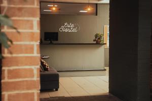 a store with a counter and a couch in a room at Central Hostel Metro10 in Guatemala