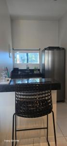 Μια τηλεόραση ή/και κέντρο ψυχαγωγίας στο Apartamento Completo Barra Grande S8