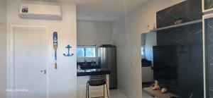 Η κουζίνα ή μικρή κουζίνα στο Apartamento Completo Barra Grande S8 +10 φωτογραφίες