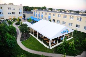 an overhead view of a tent in front of a building at Hotel Zawisza in Bydgoszcz