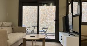 Μια τηλεόραση ή/και κέντρο ψυχαγωγίας στο Olive City Suites