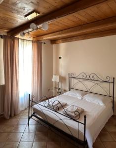 Katil atau katil-katil dalam bilik di La Fornace - Rooms & Pool