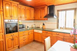 Η κουζίνα ή μικρή κουζίνα στο Maison Cosy Confortable