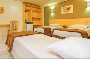 Katil atau katil-katil dalam bilik di CORAL EXPRESS Prox PUCRS, 5klm de distancia e Hospitais
