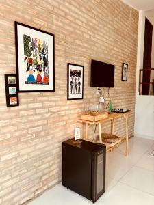 Телевизор и/или развлекательный центр в Casa do Alto Piranhas