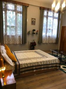 Una cama o camas en una habitación de Beaumont Homestay 377 7 fotos más