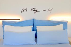 Ένα ή περισσότερα κρεβάτια σε δωμάτιο στο ANIMA family apartment
