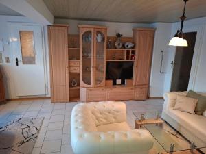 Posezení v ubytování Ferienwohnung-Haus-am-Wald