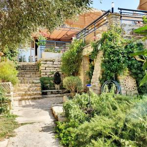 Κήπος έξω από το La Papaye, maison de charme avec piscine et Spa