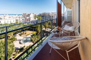 a balcony with a view of a city at MyHouse B&B - Trani dall'alto in Trani