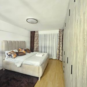 Una cama o camas en una habitación de GWAGON Nest