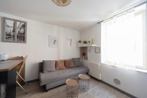 Kuchyň nebo kuchyňský kout v ubytování Charme et Tranquillité - Duplex Vintage avec Confort Moderne + 7 fotografií