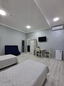 Photo de la galerie de l'établissement Neyrohelp Hotel, à Yakkasaray 11 autres photos