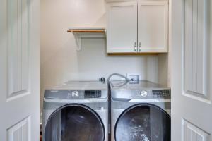 a laundry room with a washer and dryer at Quiet Hill Country Home 1 Mi to Lake LBJ Access! in Granite Shoals