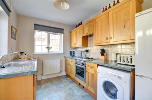 Køkken eller tekøkken på Crossing Keepers Cottage