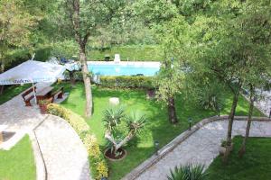 an overhead view of a garden with a swimming pool at Apartments in Fiorini - Istrien 11997 in Fiorini