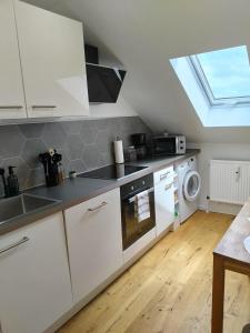 Kuchyň nebo kuchyňský kout v ubytování Country charm meets city convenience