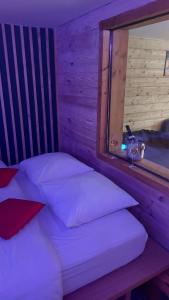 Ένα ή περισσότερα κρεβάτια σε δωμάτιο στο Appartement avec parking