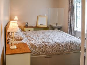 En eller flere senge i et værelse på The Ranch