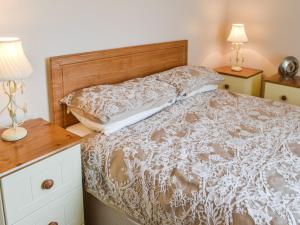 En eller flere senge i et værelse på The Ranch + 6 billeder