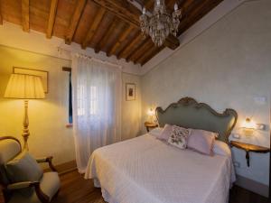 Postel nebo postele na pokoji v ubytování Holiday home in Cortona