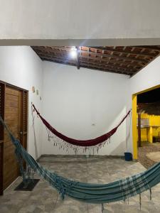 hamak w środku pokoju w obiekcie casa w mieście São José da Coroa Grande