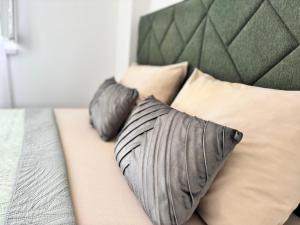 Postel nebo postele na pokoji v ubytování Apartman Leo