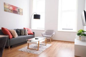 Posezení v ubytování Modern living in city center - fully equipped