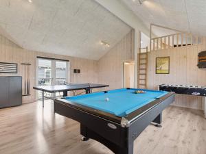 a billiard room with two ping pong tables at 5 star holiday home in Spøttrup in Spottrup