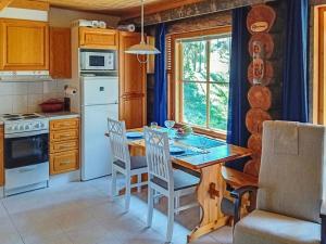 Kuchyň nebo kuchyňský kout v ubytování Holiday Home Teerentie - fun - dasher by Interhome + 16 fotografií