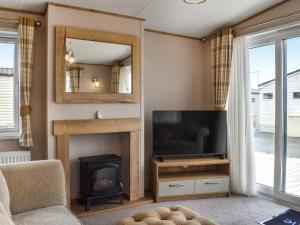 Μια τηλεόραση ή/και κέντρο ψυχαγωγίας στο Ambleside Lodge +19 φωτογραφίες