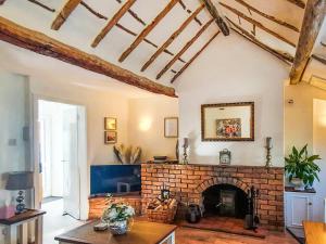 Televiisor ja/või meelelahutuskeskus majutusasutuses Sunnyside Cottage