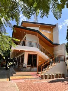 a building with a staircase in front of it at The Bistro House - Govantes Guesthouse in San Vincente