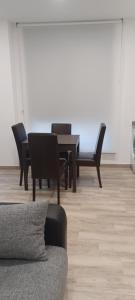 a dining room with a table and chairs at El Rincón de Perez A in Ajo