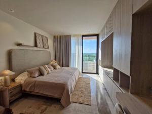 Ένα ή περισσότερα κρεβάτια σε δωμάτιο στο Beautiful Studio Puerto Morelos +52 φωτογραφίες