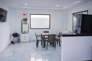 Televiisor ja/või meelelahutuskeskus majutusasutuses Cabaña Cerca de Cartagena