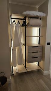 a room with a bunk bed and a dresser at LUUM by Norus in Santiago