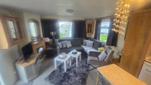Posezení v ubytování Cozy Family Caravan Skegness Holiday Park