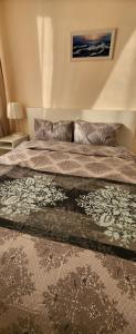 Ένα ή περισσότερα κρεβάτια σε δωμάτιο στο Apartament Silvi Super View