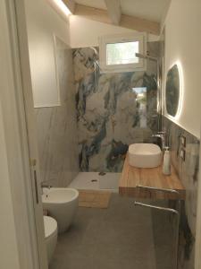 Et badeværelse på Villa LORY SWEET GARDENIA