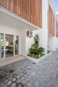 an open living room and dining area of a house at Sunrise Bliss 13 Ricefield View Private Pool Villa By Bali Bliss Properties in Dalung