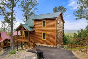 a log cabin with a metal roof at Heavenly Haven by American Patriot Getaways in Cartertown