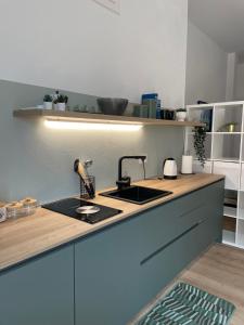 Kuchyň nebo kuchyňský kout v ubytování Casa vacanze La Casa di Leo + 4 fotografie