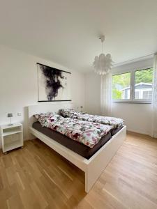 Voodi või voodid majutusasutuse Familienfreundliche Ferienwohnung mit Garten in Moos Weiler am Bodensee toas