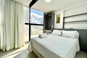 Postel nebo postele na pokoji v ubytování Flat pé na areia Breeze + 291 fotografií