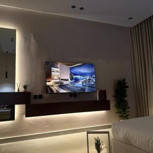 استديو أنيق بتصميم راقي tesisinde bir televizyon ve/veya eğlence merkezi