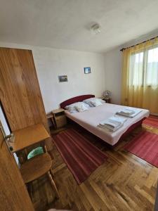Katil atau katil-katil dalam bilik di Apartman Juliana