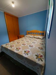 Кровать или кровати в номере Cabaña Vista al Valle +2 фотографии