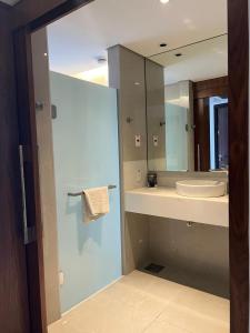 a bathroom with a sink and a mirror at Hotel Nacional in Rio de Janeiro