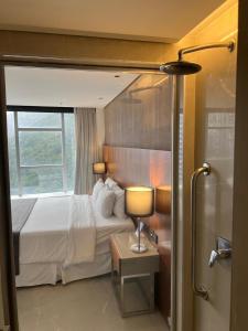 a hotel room with a bed and a window at Hotel Nacional in Rio de Janeiro